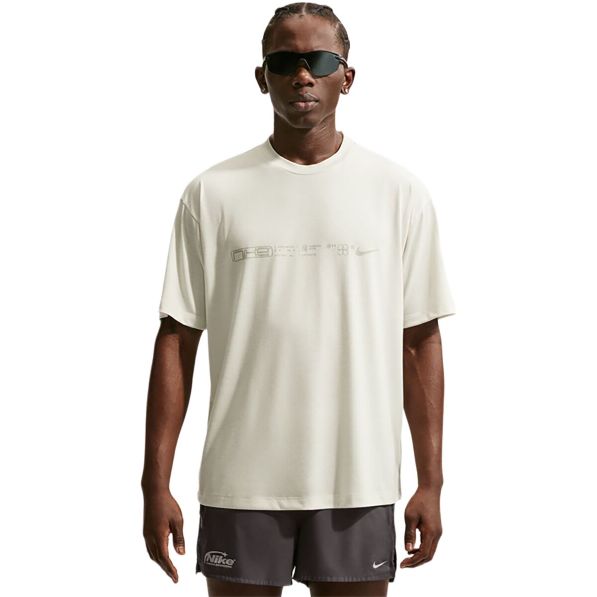 Image of Nike Dri-FIT Disrupt Short-Sleeve T-Shirt - Men's Sea Glass/Saffron Quartz, S