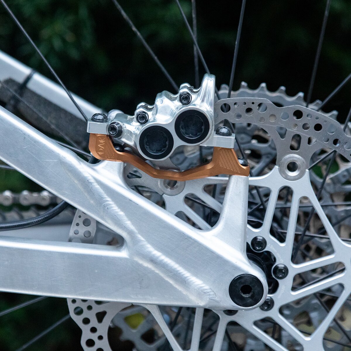 Image of OAK Components Plasmadapt Brake Adapter Kash Gold, PM +40/43mm