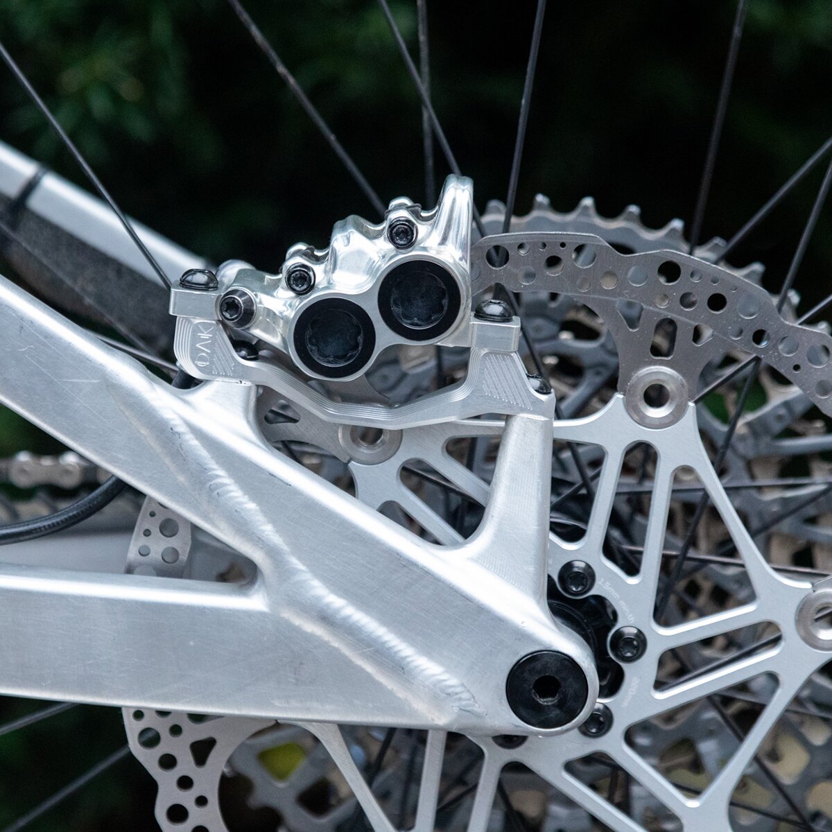 Image of OAK Components Plasmadapt Brake Adapter Raw, PM +20mm