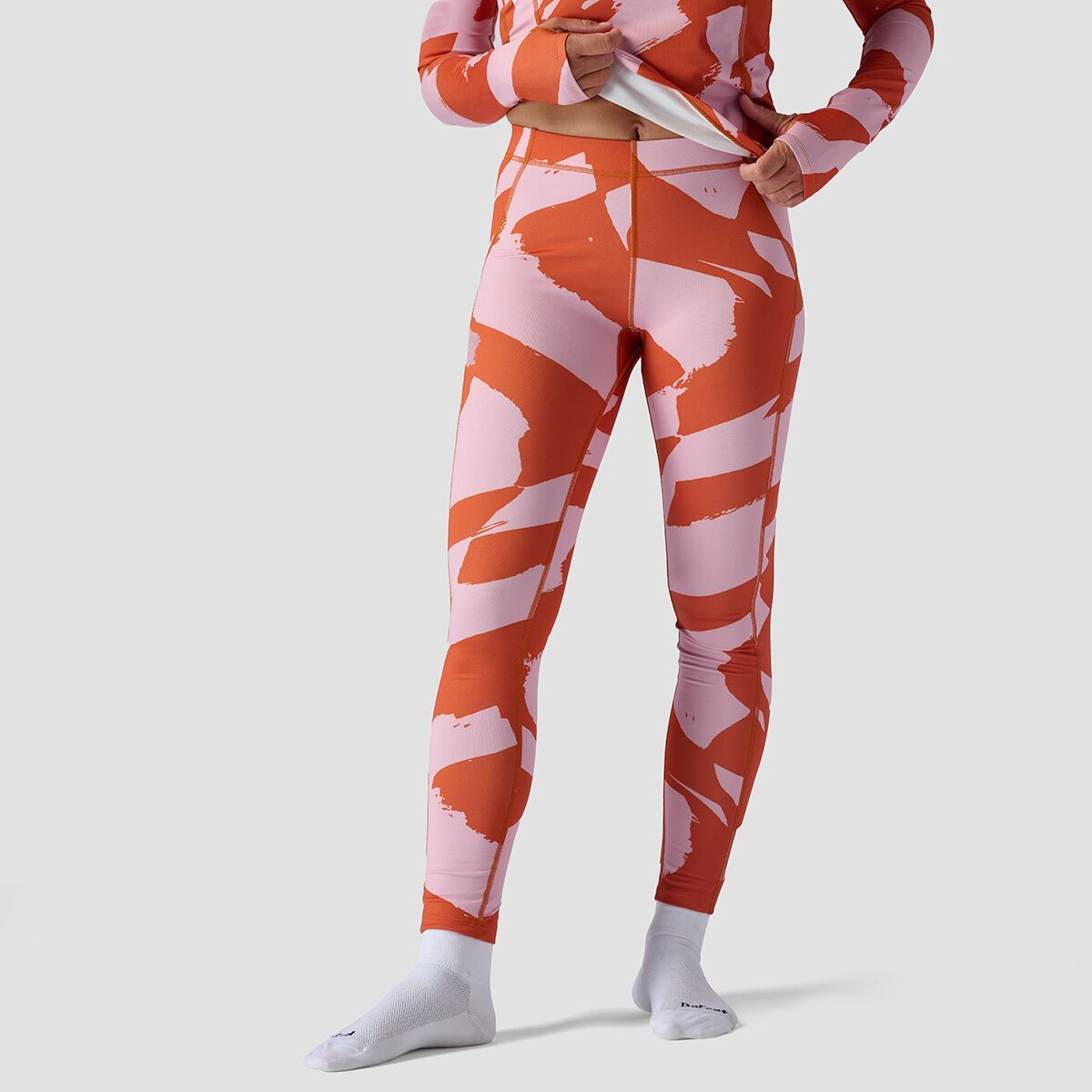 Image of Stoic Lightweight Poly Baselayer Bottom - Women's Pink/Rust Wavy Checker Print, S