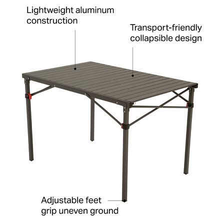 Eureka camping folding table setup on uneven ground