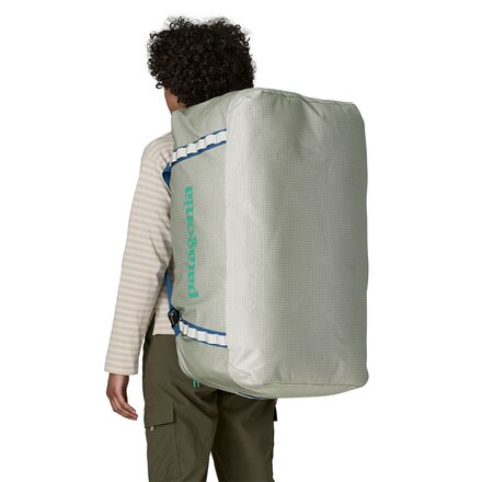 patagonia black hole duffel white Black / 55L in the striking colour of Pufferfish Gold Patagonia Black Hole Duffel Bag